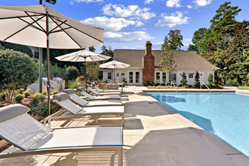 Poolside Relaxing Chairs at Caveness Farms Apartments, North Carolina 